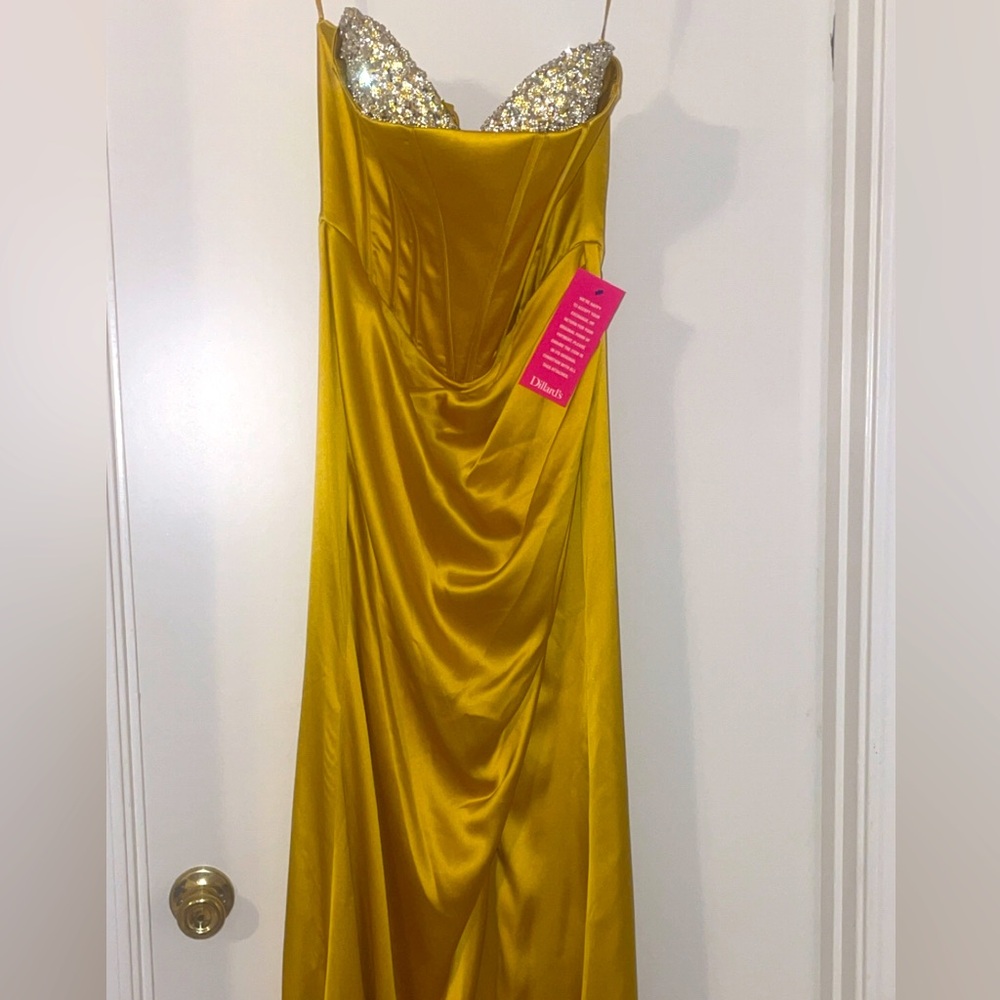 Brand nee never worn Gianni Bini long gown dresses. 
Gold size7 and Orange size9